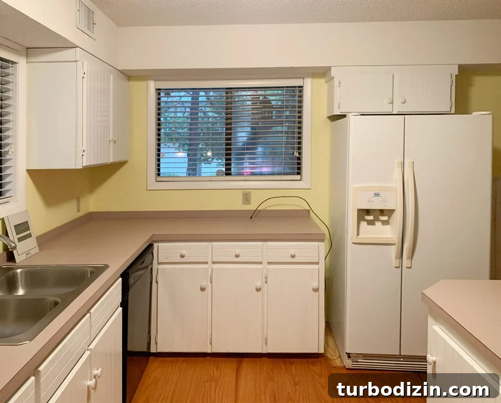 Kitchen Before Photo With Pink Counters And Yellow Walls