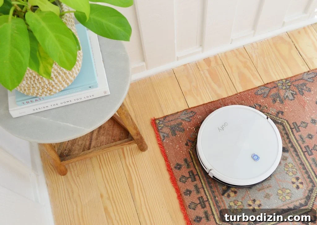Are Robot Vacuums Worth the Investment? 2 Eufy RoboVac 11S Robotic Vacuum On Traditional Runner