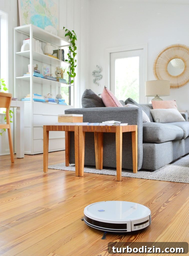 Are Robot Vacuums Worth the Investment? 10 Eufy RoboVac 11S Robot Vacuum Cleaning Upstairs Family Room Wood Floor
