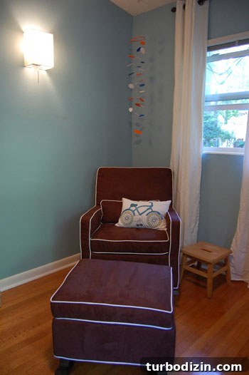Blue Nursery Design Featuring a Charming Bike Mural 4 nursery-after3