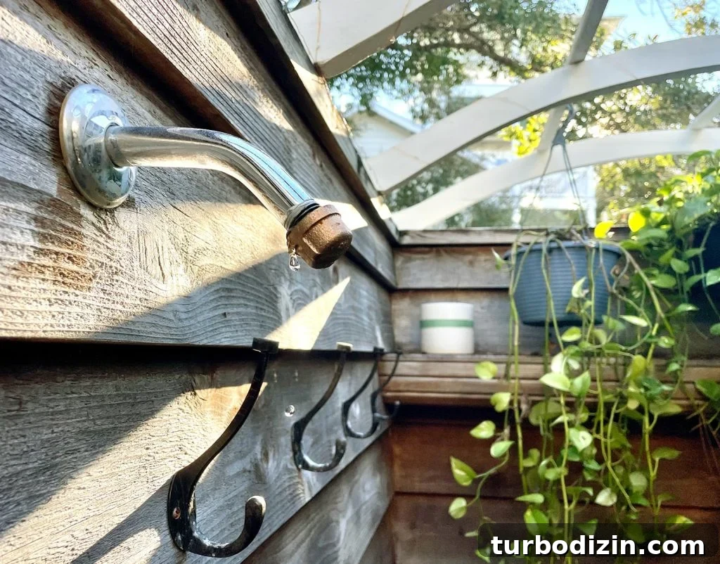 Outdoor Shower With Cap Placed On So It Can Drip To Prevent Freezing