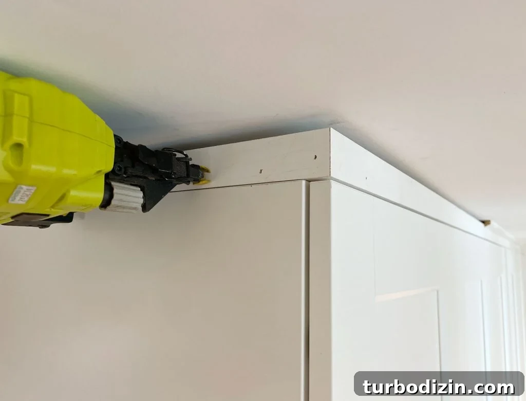 Make an Ikea PAX Wardrobe Look Like a Built-In Closet 9 Nailing Trim To Top Of Built In Ikea Pax Wardrobe