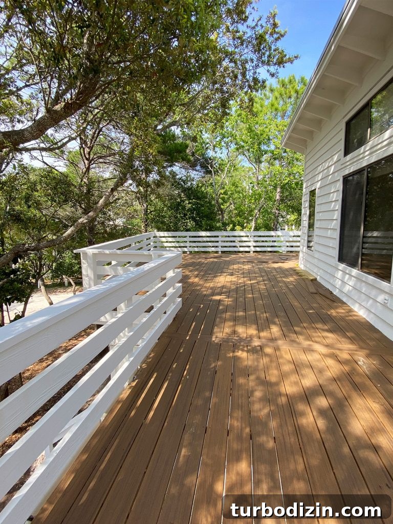 How Four People Share One Bathroom: Practical Tips That Work 4 Large outside deck on white house with lots of trees