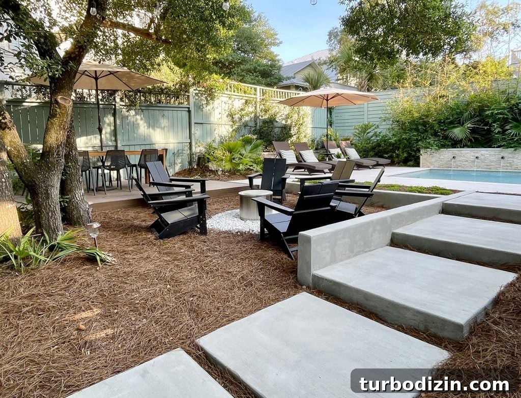 How We Transformed and Doubled Our Backyard Pool Area Space 11 Concrete Steps Leading Up To Pool In Backyard With Firepit