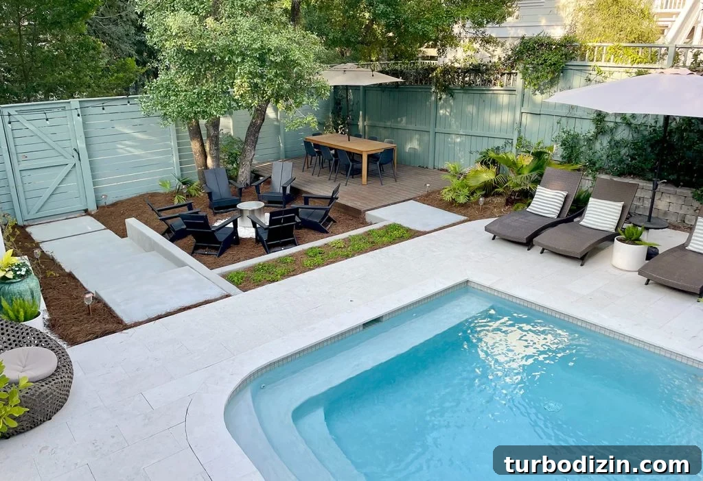 How We Transformed and Doubled Our Backyard Pool Area Space 14 Overhead View Of Larger Backyard Pool Area With Lounge And Dining Area