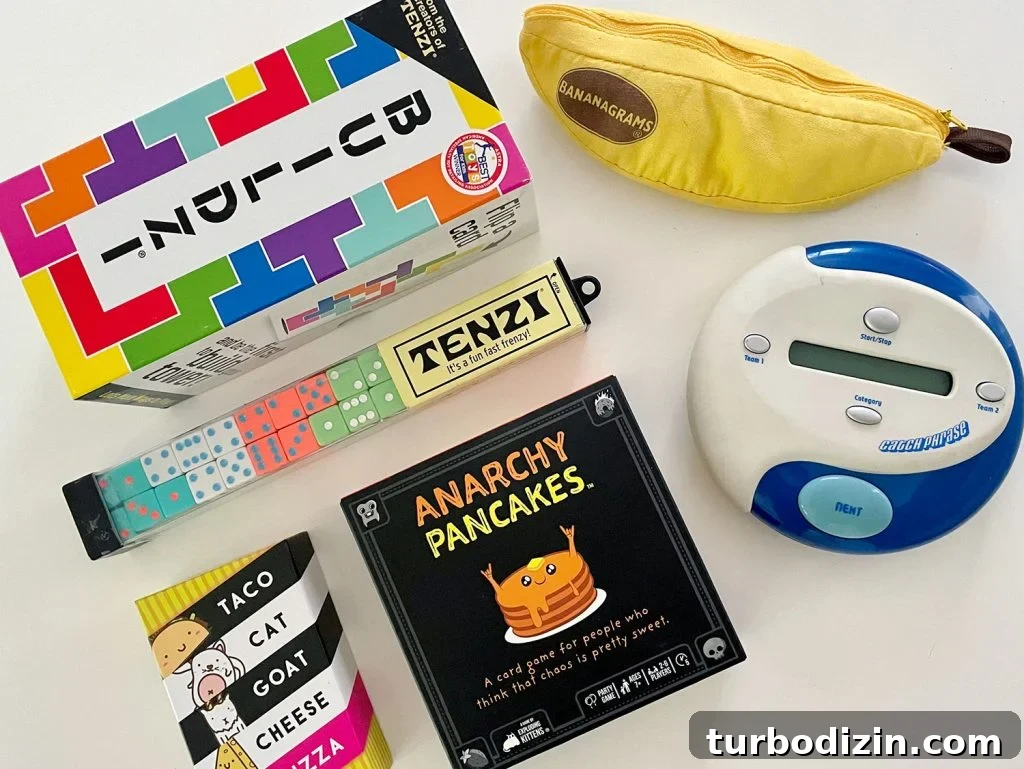 Top Family Board Games for Fun Nights With Kids 11 Best Fast Paced Games Buildzi Tenzi Bananagrams Taco Cat Goat Cheese Pizza Anarchy Pancakes Catchphrase