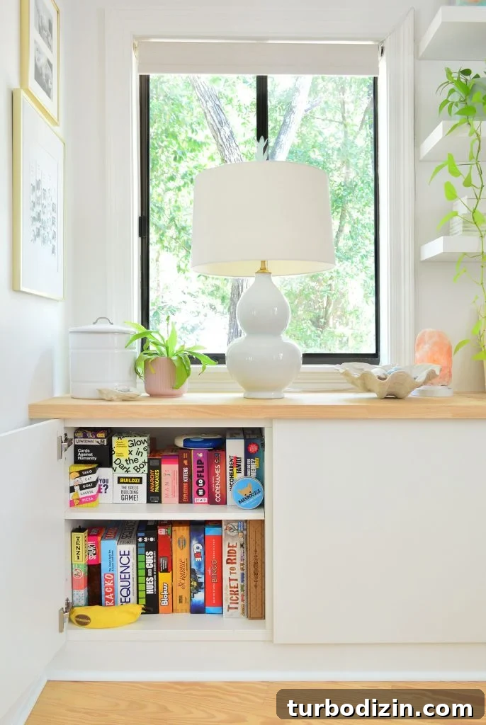 Top Family Board Games for Fun Nights With Kids 3 Ikea Besta Cabinet With Door Open Showing Family Board Game Storage