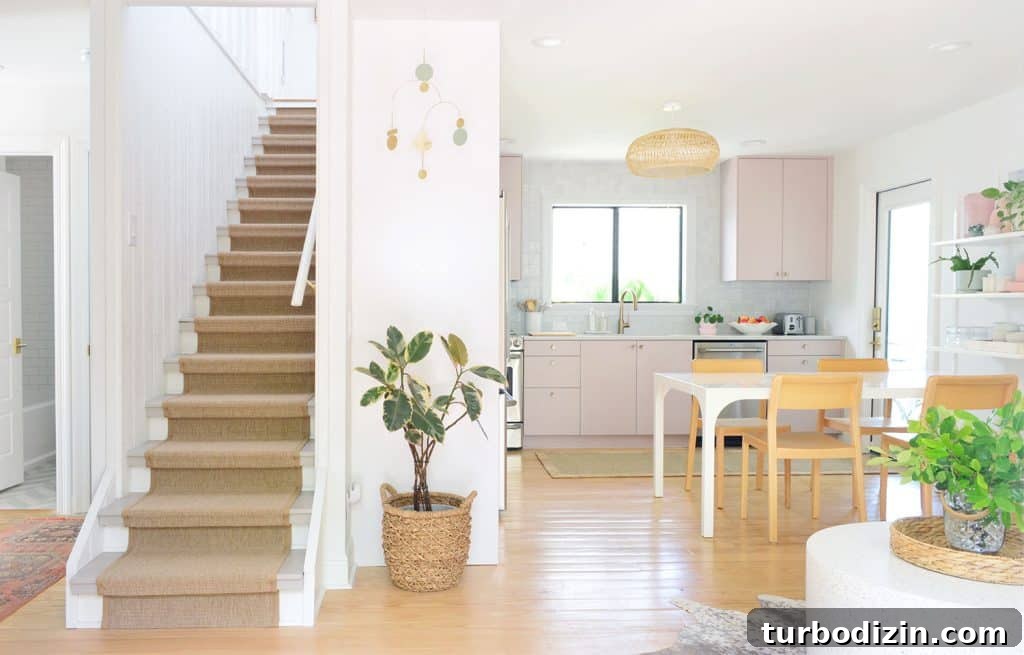 Episode 183: What’s Next, House Vibes, and Another Awkward Moment 12 View From Front Door Of Stairs And Mauve Pink Painted Kitchen Cabinets