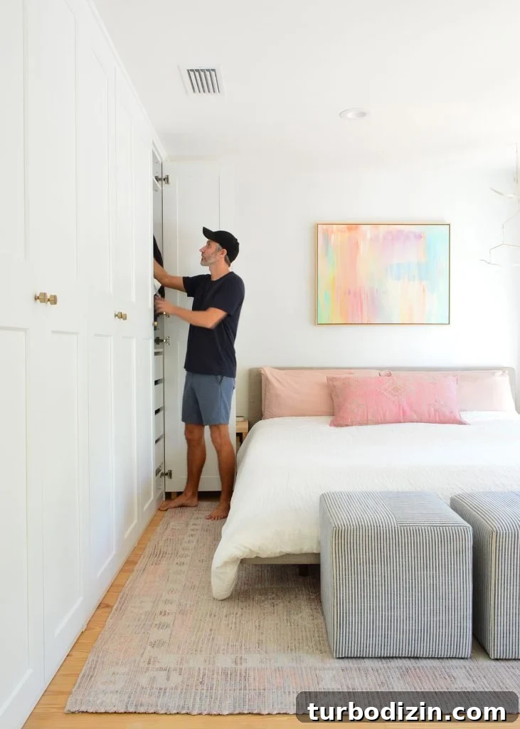 Episode 183: What’s Next, House Vibes, and Another Awkward Moment 14 John Putting Away Clothes In Ikea Pax Wardrobe