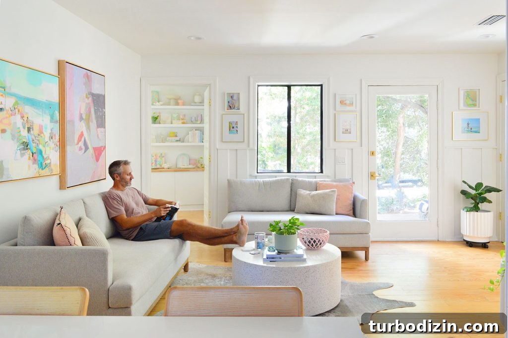 John Sitting In Kitchen Sitting Area With Two Loveseats