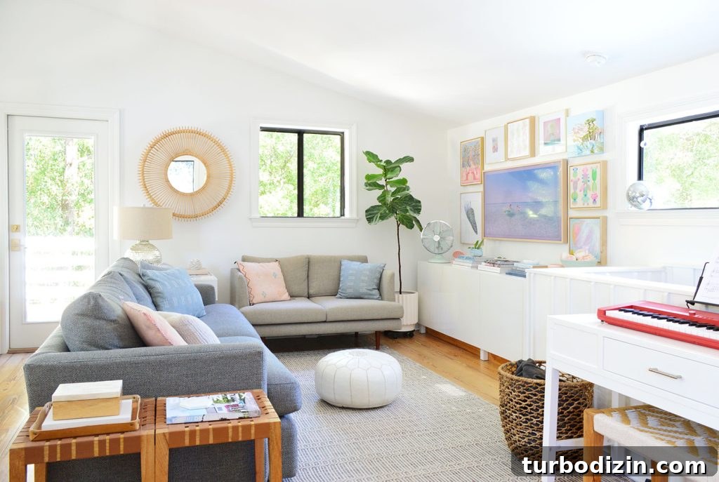 Bright Family Room With Frame TV Collage Hung On Wall