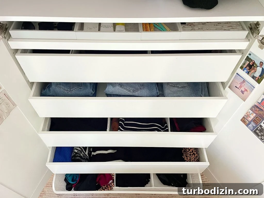 How We Optimized Our IKEA PAX Closet System for Storage 11 Ikea Pax Wardrobe Closet Drawers Open With Womens Clothes