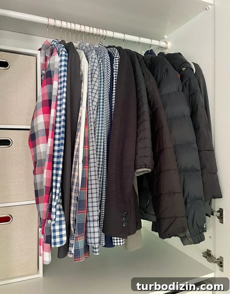 How We Optimized Our IKEA PAX Closet System for Storage 13 Ikea Pax Wardrobe Closet Mens Shirts On Hanging Bar With Winter Coats