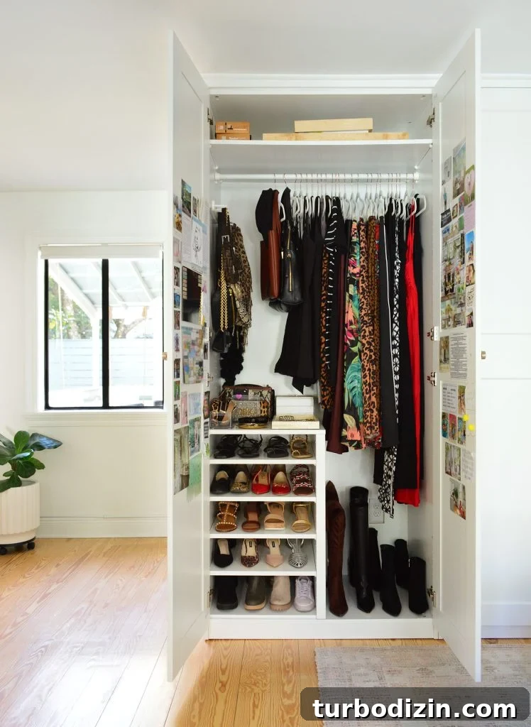 How We Optimized Our IKEA PAX Closet System for Storage 5 Open Ikea Pax Closet Wardrobe With Long Hanging Clothes And Shoe Storage