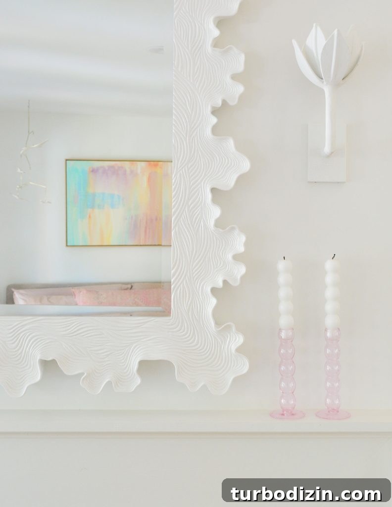 Detail Of White Sculptural Clamshell Scalloped Mirror Over Fireplace