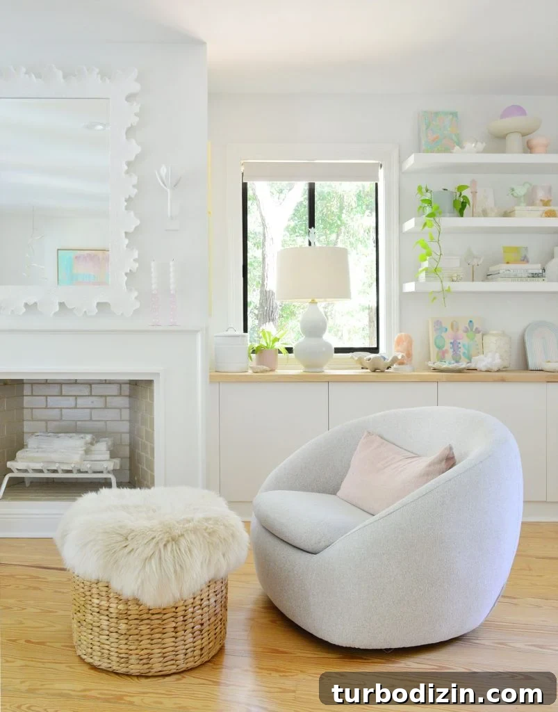 White Beachy Bedroom With West Elm Swivel Chair By Fireplace
