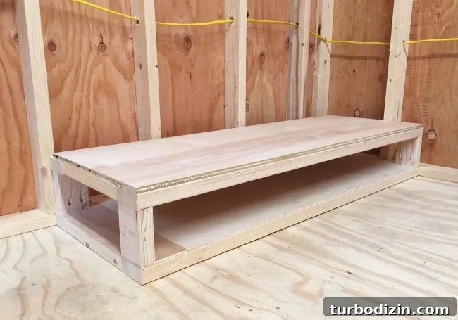 creating second flat platform on the bottom of scrap wood storage organizer