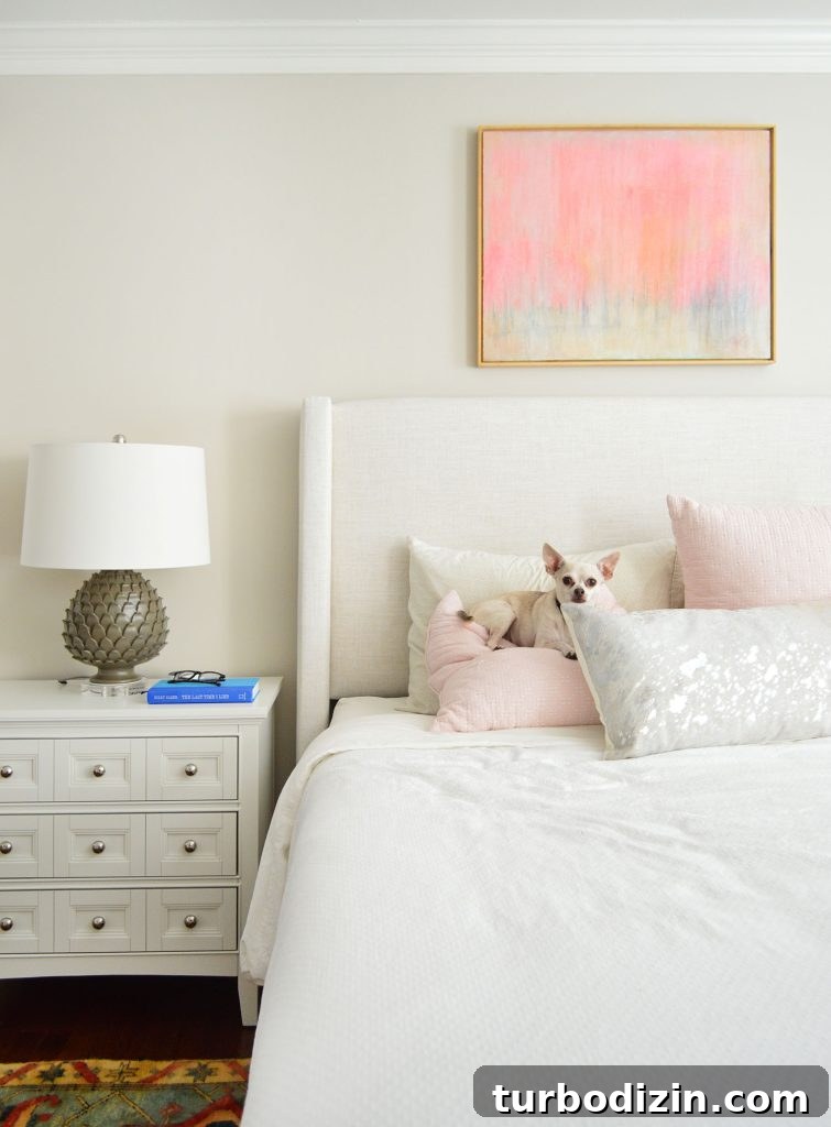 Benjamin Moore Edgecomb Gray: A Timeless Greige for Any Room 13 Detail of Upholstered Headboard With Edgecomb Gray Walls and Chihuahua