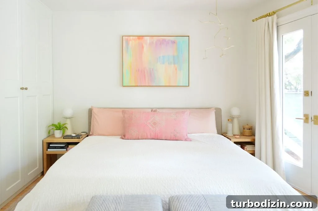 Sherwin-Williams Pure White SW 7005: Ideal Whole-House Paint Color 3 Modern Bedroom With Sherwin William Pure White Walls And Colorful Artwork