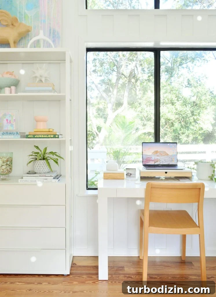 Sherwin-Williams Pure White SW 7005: Ideal Whole-House Paint Color 6 Home Office With Large Window And SW Pure White Walls