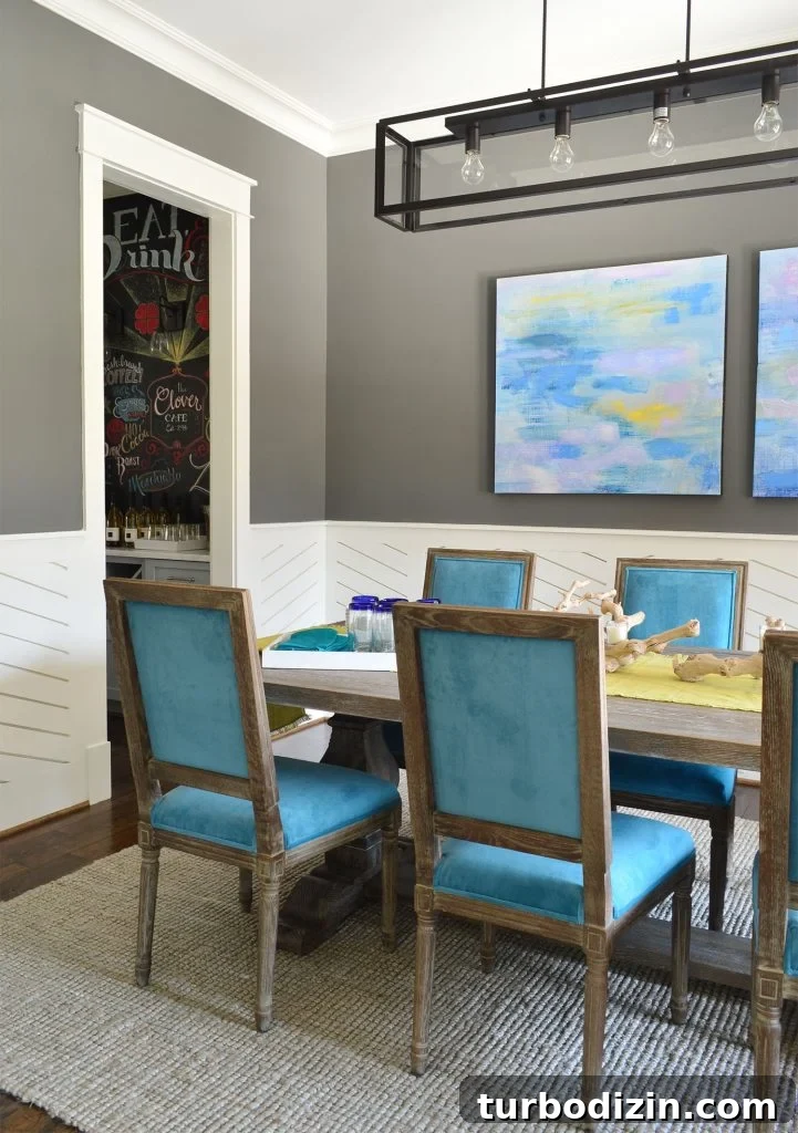 Benjamin Moore Simply White OC-117: In-Depth Color Review 11 Modern Blue Dining Room Kendall Charcoal Wall And White Wainscoting