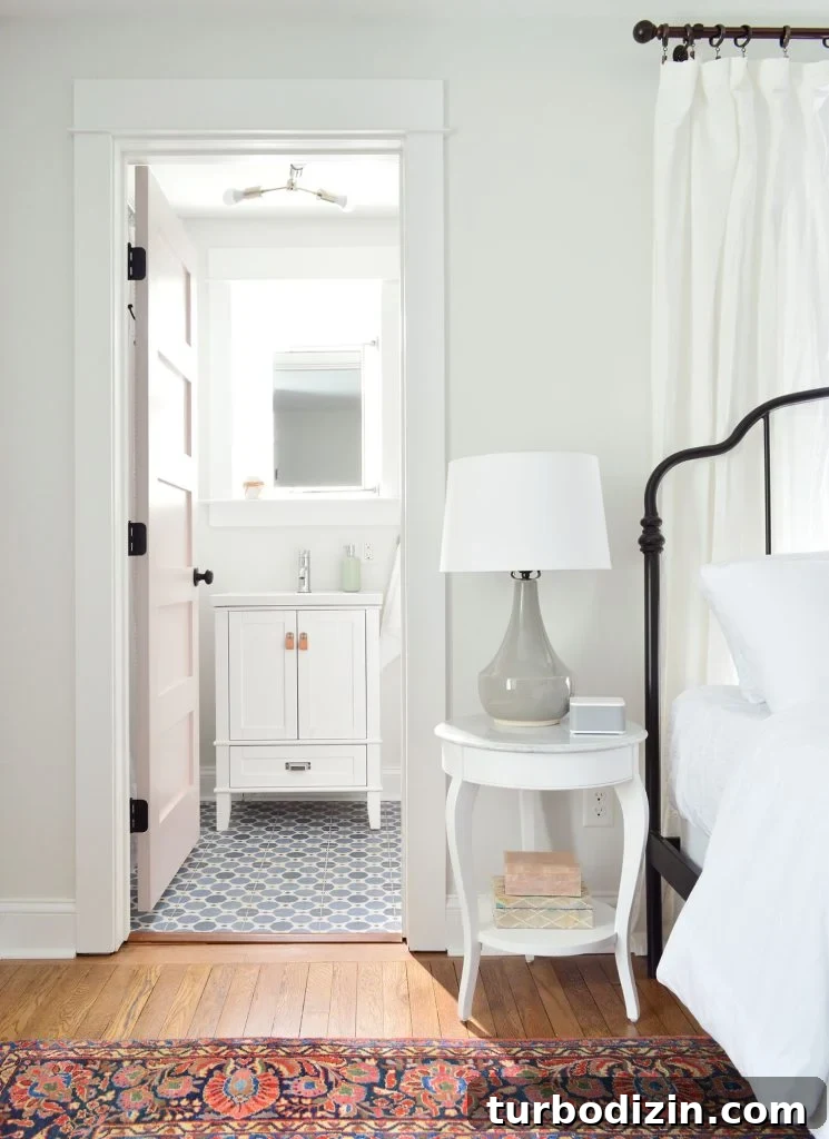 Traditional Bedroom With Iron Bed Spare White Walls Extra White Trim