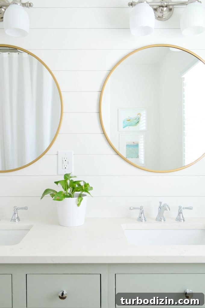 12 Expert-Recommended White Paint Colors for Every Room 23 Shiplap Bathroom With Green Cabinets Round Gold Mirrors Extra White Walls