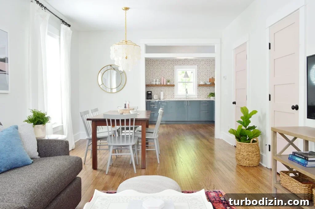 12 Expert-Recommended White Paint Colors for Every Room 29 Open Concept Living Room With Pink Doors Extra White Trim