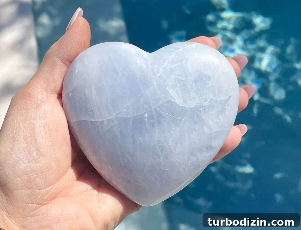 Blue Calcite Meaning and Properties: Uses, Healing & Care 3 Blue Calcite Heart Crystal Over Water