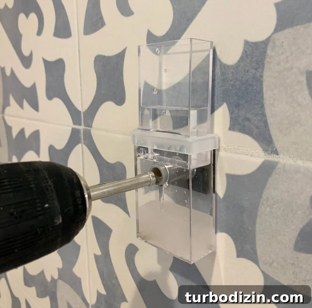 How to Install Floating Kitchen Shelves: Step-by-Step Guide 8 Screwdriver Drilling Through Tile Backsplash Using Water Delivery System