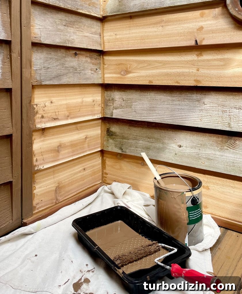 Corner Of Outdoor Shower Caulked With Cedar Colored Caulk