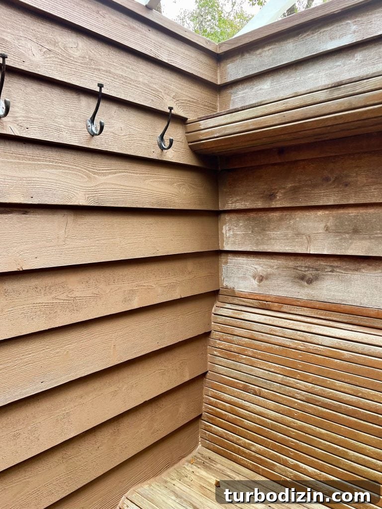 One Wall Of Outdoor Shower Completed With Tugboat Solid Stain by Behr