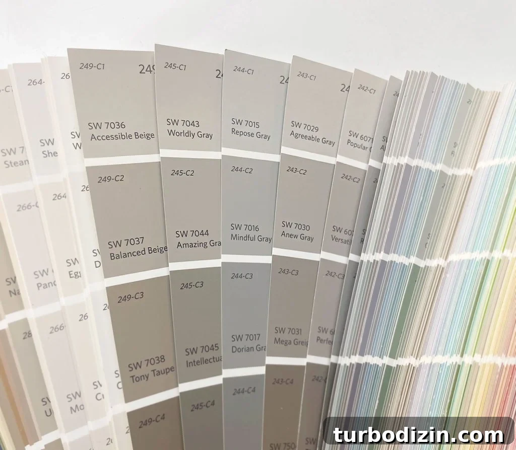 9 Expert-Recommended Greige Paint Colors You’ll Love 6 Greige Color Swatches In Sherwin Williams Paint Fan Deck