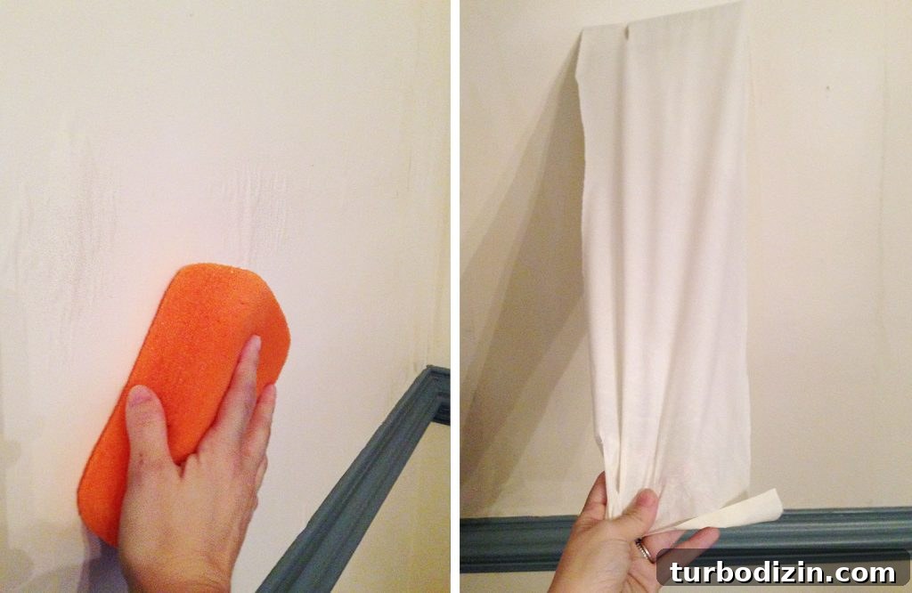 Large Sponge Wiping On Wall To Remove Strip Of Wallpaper Glue