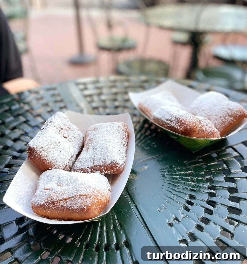 48 Hours in New Orleans with Kids: Family Weekend Guide 23 Beignets On Cafe Table In New Orleans