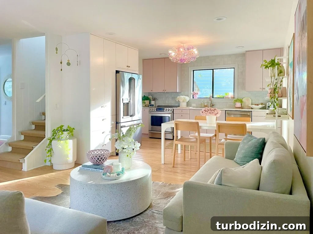 Small Ikea Kitchen With Mauve Cabinets And Glass Bubble Light Fixture