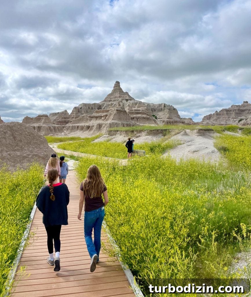 South Dakota Summer Road Trip: Top Sights & Itinerary Ideas 4 Kids Walking On Boardwalk Hike In Badlands National Park South Dakota