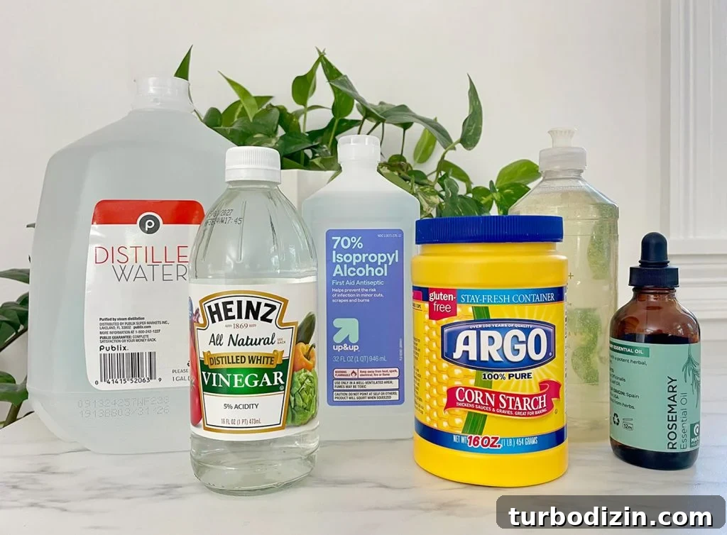 Homemade Window Cleaner Recipe for Streak-Free Glass 4 Active Cleaning Ingredients In Homemade Glass Cleaner Distilled Water White Vinegar Rubbing Alcohol CornStartch Dish Soap And Essential Oil