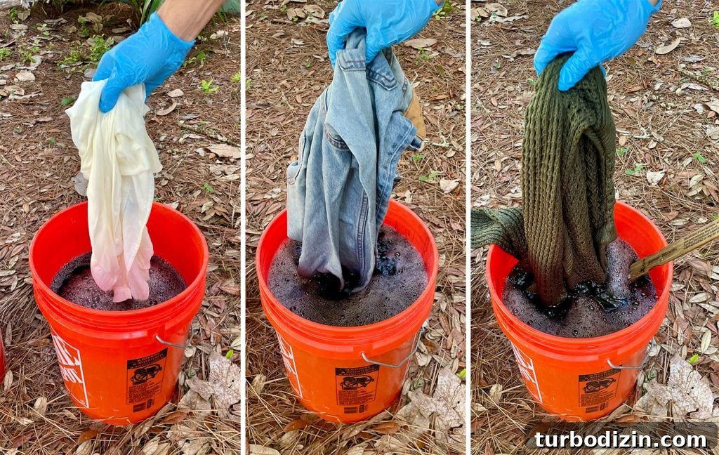 How to Dye Clothes at Home: Step-by-Step Guide for Vibrant Results 11 Adding Three Pieces of Clothing To Black Rit Fabric Dye Bucket