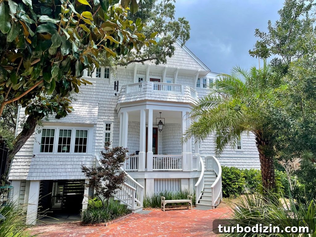 Downsizing Journey: What Changed After Nearly 5 Years 11 Large White Shingle House Among Trees