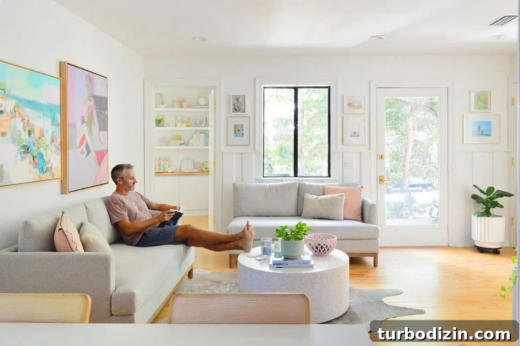 Downsizing Journey: What Changed After Nearly 5 Years 4 John Sitting In Kitchen Sitting Area With Two Loveseats