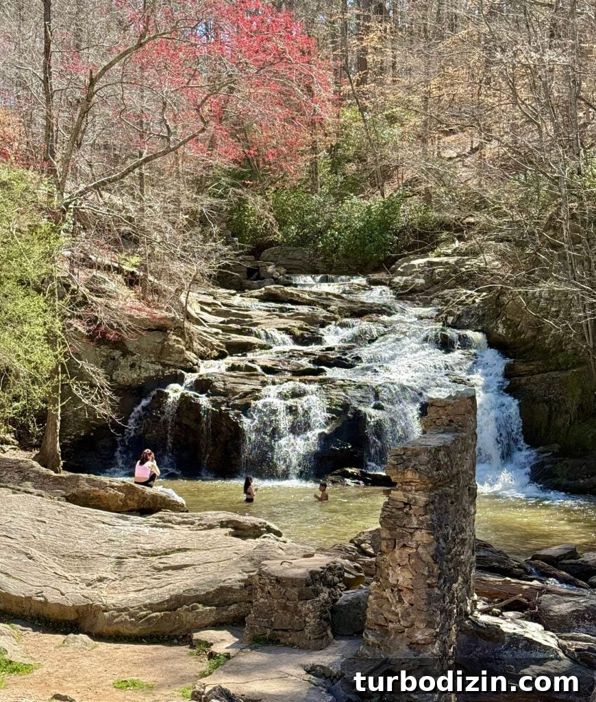 Weekend Escape to Serenbe, Georgia: What to See & Do 10 People Playing In Waterfall at Cochran Mills Park Near Serenbe Georgia
