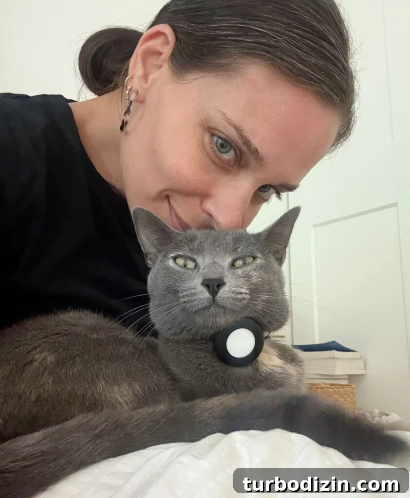 How I Reduced My Cat Allergies: Treatments That Helped Me 3 Sherry putting face on head of cat