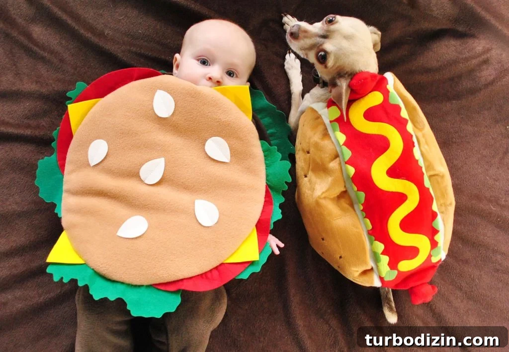 200 Male Dog Names and Smart Tips for Choosing One 4 Baby Dressed as Hamburger Next to Dog In Hot Dog Costume