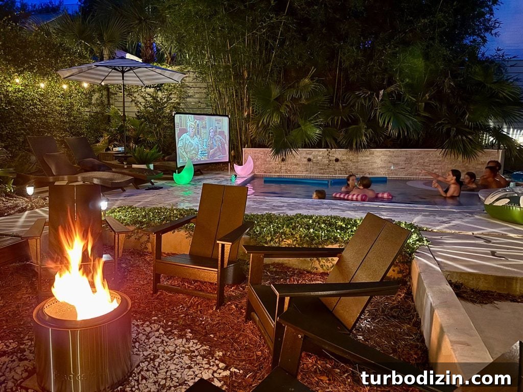 5 Creative S'mores Upgrades — Including Savory S'mores! 17 Backyard Pool Area With Firepit And Outdoor Movie Screen