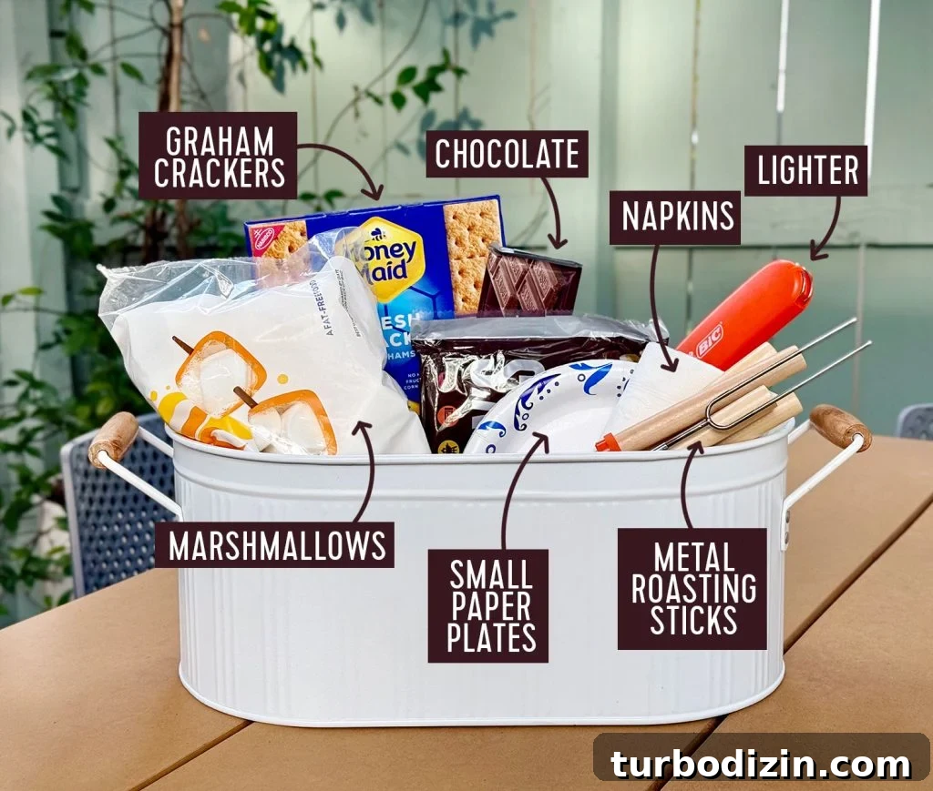 5 Creative S'mores Upgrades — Including Savory S'mores! 4 Smores Supply Kit In Metal Tin With Ingredients Lighter Plates Napkins And Metal Roasting Sticks