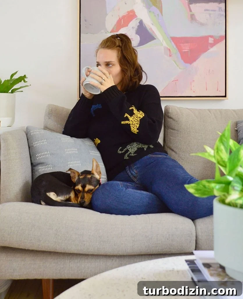 Sherry Sitting With Penny Dog On Couch Drinking Coffee