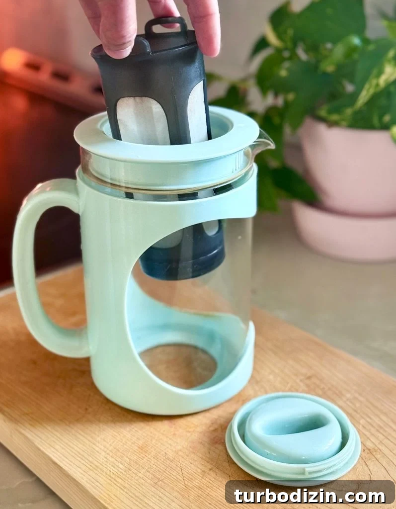 Cold Brew Coffee at Home: Step-by-Step Guide for Smooth Flavor 6 Addding Filter To Home Cold Brew Coffee Maker