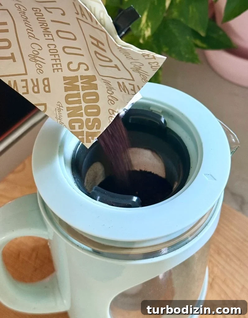 Cold Brew Coffee at Home: Step-by-Step Guide for Smooth Flavor 7 Adding Ground Coffee To Filter Of Cold Brew Maker
