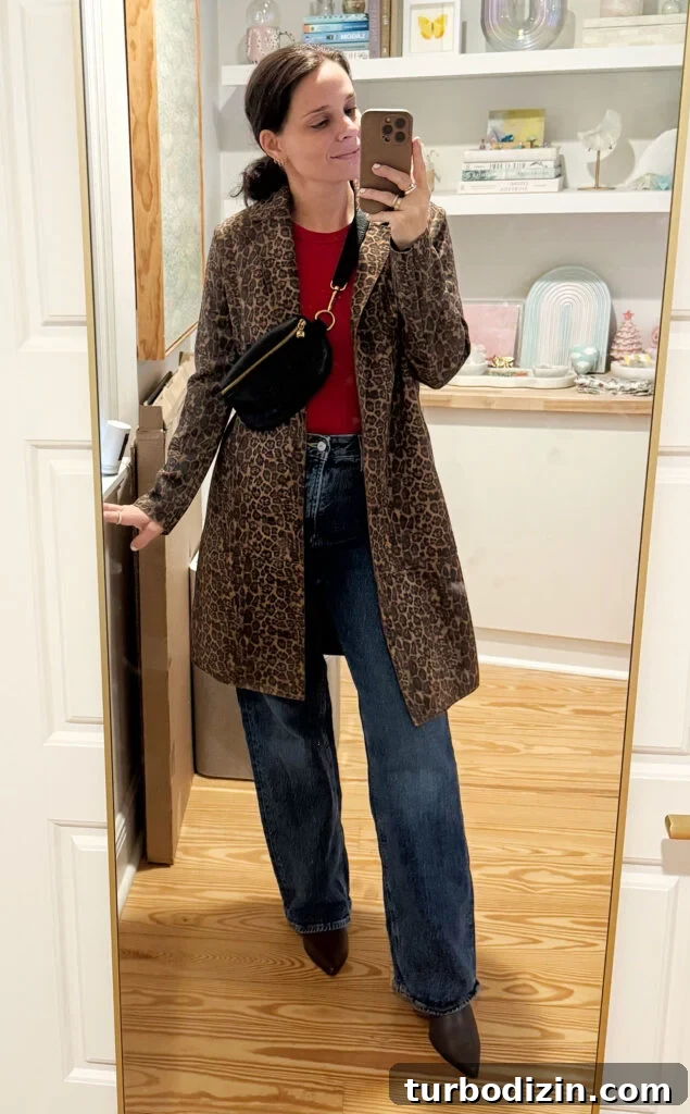 Packing Light for Italy: My Proven Minimalist Travel Wardrobe 5 Sherry Mirror Selfie In Outfit For Italy Red Tank Leopard Jacket Jeans